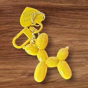 New Bright Yellow balloon dog keychain with a heart charm